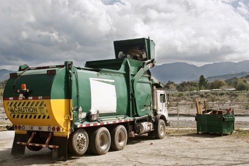 Low-carbon van used by skip hire operator on collection route